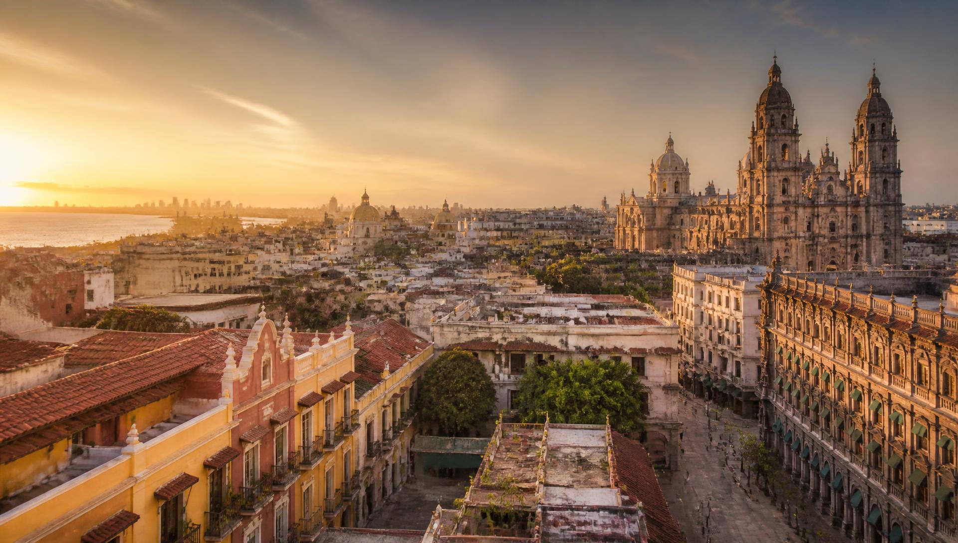 Panoramic view blending Colombian and Mexican colonial cities at golden hour